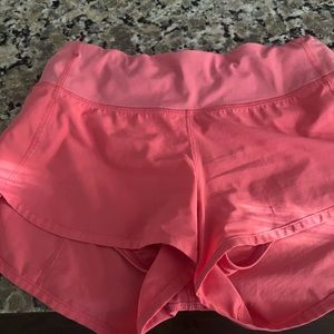 Pink Lululemon speed up shorts. Size 2